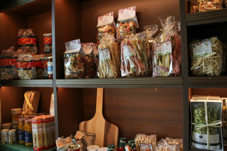 Packed foods on a retail shelf, wrapped in paper bags with no visible branding.